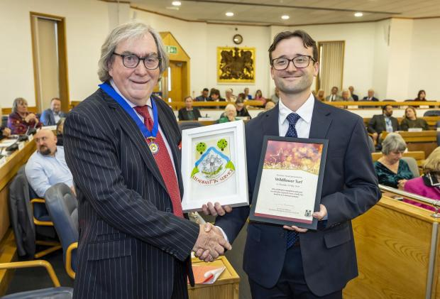 Oliver Hewetson-Brown receiving the Mayor's Award for Business